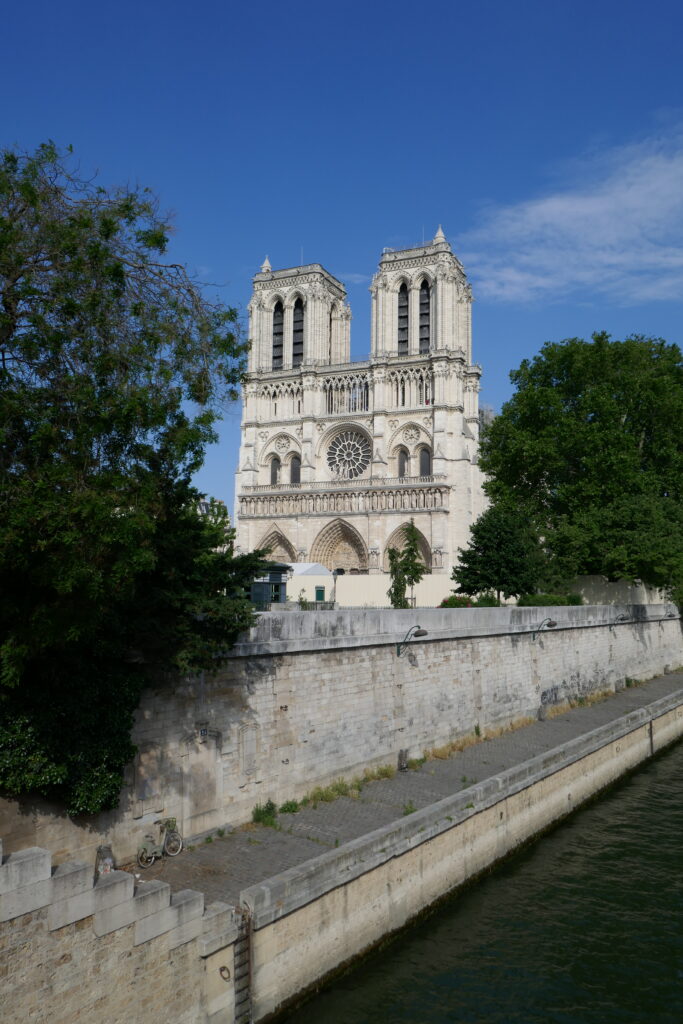 Abandoned Bike Share in front of  the recently burned Notre Dame Cathedral, June 18, 2019