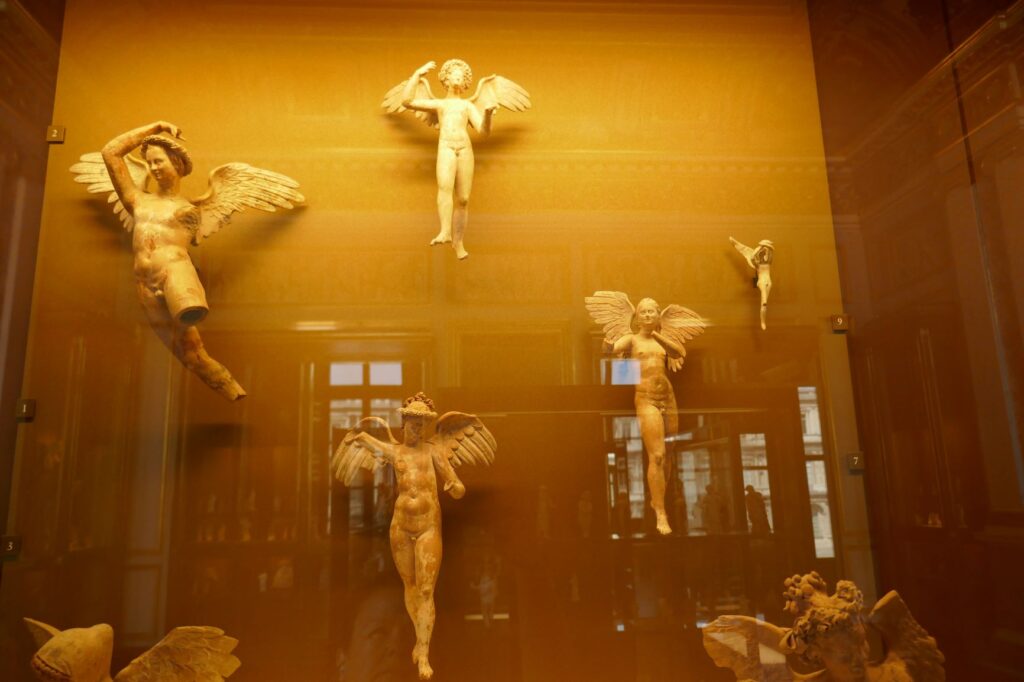 Mini Winged Victories at the Louvre, June 27, 2019